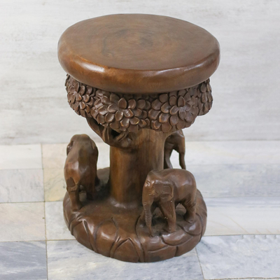 Wood stool, 'Around the Tree in Brown' - Wood Stool of Elephants Around a Tree in Brown from Thailand