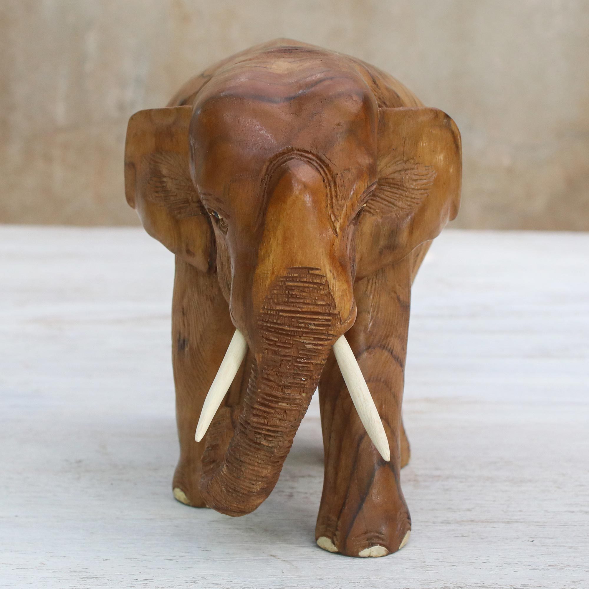 Teak Wood Sculpture of a LeftFacing Elephant from Thailand Go For a