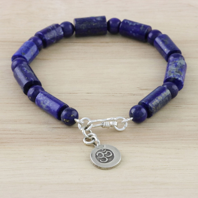 Lapis lazuli beaded bracelet, 'Oceanic Om' - Lapis Lazuli Om Beaded Bracelet from Thailand