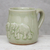 Celadon ceramic mug, 'Playful Elephants' - Elephant-Themed Celadon Ceramic Mug from Thailand thumbail