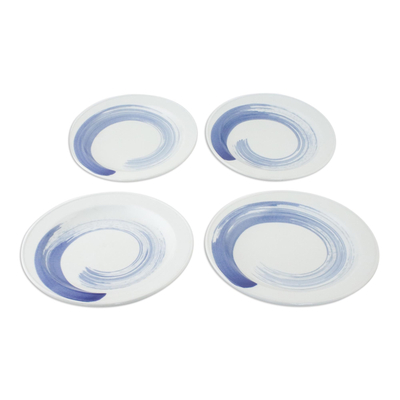 Ceramic luncheon plates, 'Blue Winds' (set of 4) - Four Artisan Crafted Blue and White Ceramic Luncheon Plates