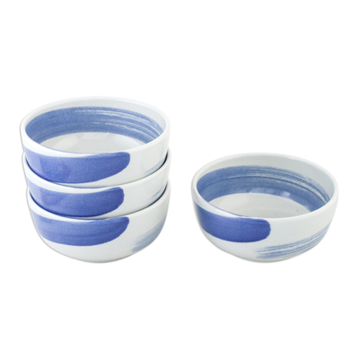 Ceramic cereal bowls, 'Blue Winds' (set of 4) - Handcrafted Blue and White Ceramic Set of Four Bowls
