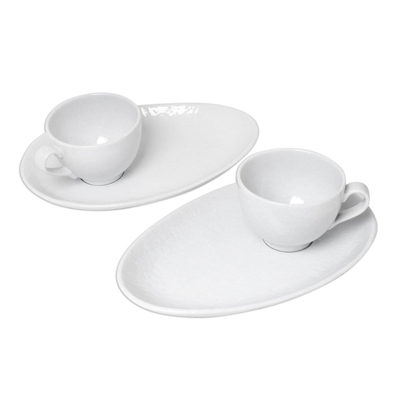 Ceramic cups and snack plates, 'Snow White' (set for two) - Artisan Crafted White Ceramic Set of Two Cup and Snack Plate