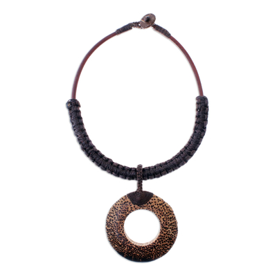 Wood and leather pendant necklace, 'Earth Ring in Dark Brown' - Handcrafted Coconut Wood and Leather Cord Pendant Necklace