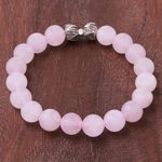 Rose quartz beaded stretch bracelet, 'Leafy Pink' - Leaf-Themed Rose Quartz Beaded Stretch Bracelet