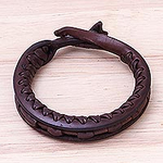 Artisan Crafted Leather Bangle Bracelet from Thailand, 'Surrounded by Beauty'