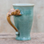 Celadon ceramic mug, 'Elephant Handle in Green' - Elephant-Themed Celadon Ceramic Mug from Thailand thumbail