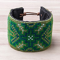 Cotton wristband bracelet, 'Hmong Cross' - Cross-Stitched Green Hmong Cotton Wristband Bracelet