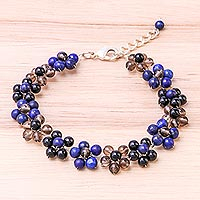 Lapis lazuli beaded bracelet, 'Rainbow Blossom' - Lapis Lazuli and Glass Beaded Bracelet from Thailand