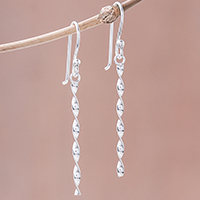 Sterling silver dangle earrings, 'Spinning Gleam' - Spiraling Sterling Silver Dangle Earrings from Thailand