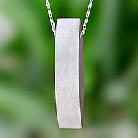 Sterling silver and wood pendant necklace, 'Sophisticated Figure'