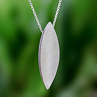 Sterling silver and wood pendant necklace, 'Sophisticated Form' - Sterling Silver and Wood Pendant Necklace from Thailand