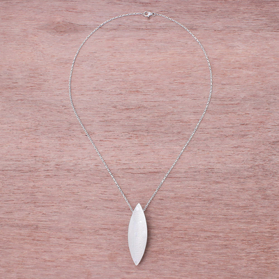 Sterling silver and wood pendant necklace, 'Sophisticated Form' - Sterling Silver and Wood Pendant Necklace from Thailand