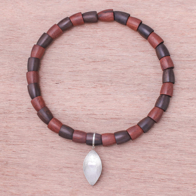 Sterling silver and wood beaded pendant necklace, 'Fascinating Leaf' - Sterling Silver and Wood Beaded Pendant Necklace