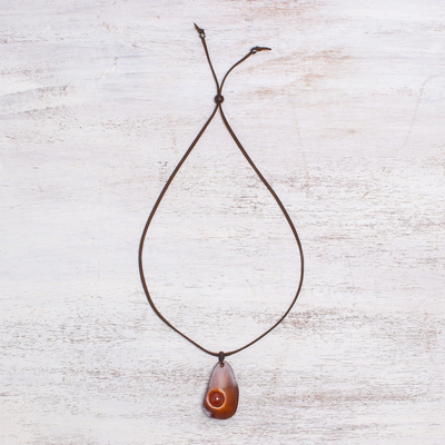Carnelian and leather pendant necklace, 'Stylish Avocado' - Carnelian and Leather Pendant Necklace from Thailand