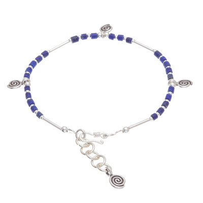 Lapis lazuli beaded charm bracelet, 'Spiral Blue' - Spiral Motif Lapis Lazuli Beaded Charm Bracelet