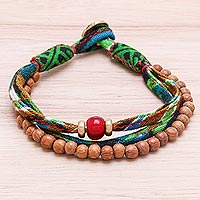 Wood and cotton beaded strand bracelet, 'Intricate Appeal' - Wood and Cotton Beaded Strand Bracelet from Thailand