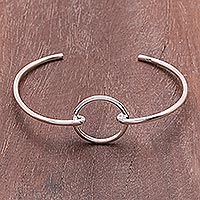 Sterling silver cuff bracelet, 'Circular Space' - Modern Sterling Silver Cuff Bracelet with a Circular Pendant