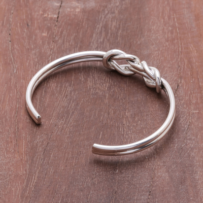 Sterling silver cuff bracelet, 'Double Knot' - Knotted Sterling Silver Cuff Bracelet from Thailand