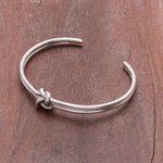 Sterling silver cuff bracelet, 'Love Knot' - Knot Motif Sterling Silver Cuff Bracelet from Thailand