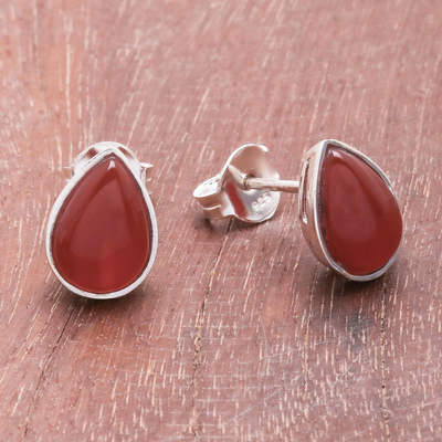 Carnelian stud earrings, 'Droplet Gleam' - Drop-Shaped Carnelian Stud Earrings from Thailand