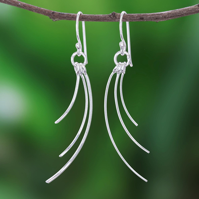Sterling silver dangle earrings, 'Charming Swoop' - Swooping Sterling Silver Dangle Earrings from Thailand