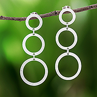 Sterling silver dangle earrings, 'Moon Triplets' - Circle Pattern Sterling Silver Dangle Earrings from Thailand