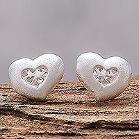 Sterling silver stud earrings, 'A Lot of Love' - Heart-Shaped Sterling Silver Stud Earrings from Thailand
