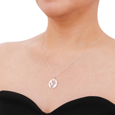 Sterling silver pendant necklace, 'Generations' - Hand Motif Inspirational Sterling Silver Pendant Necklace