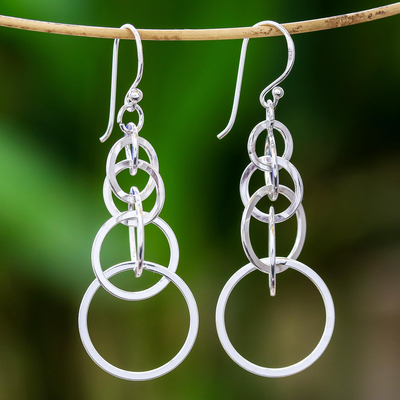 Sterling silver dangle earrings, 'Bubbly Rain' - Circle Pattern Sterling Silver Dangle Earrings from Thailand