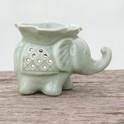 Celadon ceramic oil warmer, 'Elephant and Leaf' - Celadon Ceramic Elephant Oil Warmer from Thailand