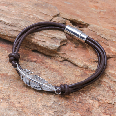 Stainless steel and leather pendant bracelet, 'Stunning Feather in Brown' - Stainless Steel and Brown Leather Feather Pendant Bracelet