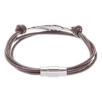 Stainless steel and leather pendant bracelet, 'Stunning Feather in Brown' - Stainless Steel and Brown Leather Feather Pendant Bracelet