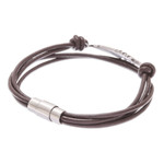 Stainless steel and leather pendant bracelet, 'Stunning Feather in Brown' - Stainless Steel and Brown Leather Feather Pendant Bracelet