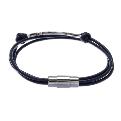 Stainless steel and leather pendant bracelet, 'Stunning Feather in Navy' - Stainless Steel and Navy Leather Feather Pendant Bracelet