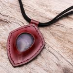 Amethyst and leather pendant necklace, 'Bold Shield' - Amethyst and Leather Pendant Necklace from Thailand