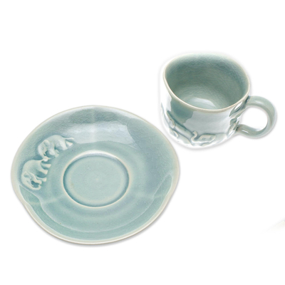 Celadon ceramic teacup and saucer, 'True Elephants' - Elephant-Themed Celadon Ceramic Teacup and Saucer