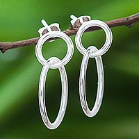 Sterling silver dangle earrings, 'Dual Rings' - Ringed Sterling Silver Dangle Earrings from Thailand