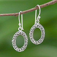 Sterling silver dangle earrings, 'Oval Fascination' - Patterned Oval Sterling Silver Dangle Earrings from Thailand