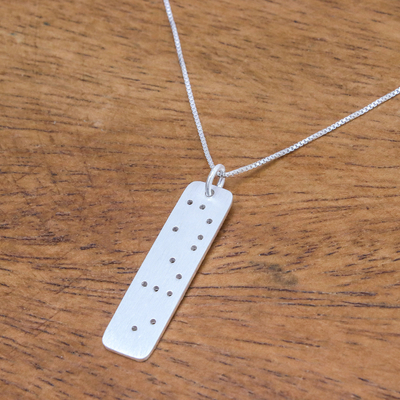 Sterling silver pendant necklace, 'Simple Smile' - Smile-Themed Braille Cutout Sterling Silver Pendant Necklace