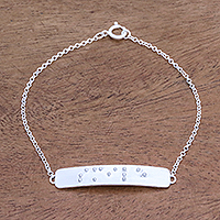 Sterling silver pendant bracelet, 'Braille Smile' - Smile-Themed Braille Sterling Silver Pendant Bracelet