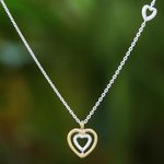 Gold accented sterling silver pendant necklace, 'Lovely Heart' - Heart-Shaped Gold Accented Sterling Silver Pendant Necklace