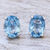 Blue topaz stud earrings, 'London Ovals' - Faceted Blue Topaz Stud Earrings from Thailand (image 2) thumbail
