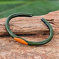Leather cuff bracelet, 'Green-Orange Eye' - Green and Orange Leather Cuff Bracelet from Thailand