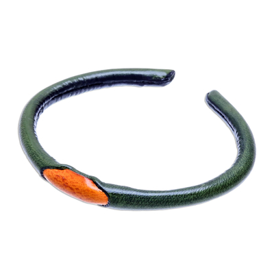 Leather cuff bracelet, 'Green-Orange Eye' - Green and Orange Leather Cuff Bracelet from Thailand