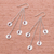 Garnet dangle earrings, 'Song of Rain' - Circle Pattern Modern Garnet Dangle Earrings from Thailand