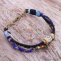 Glass and cotton beaded strand bracelet, 'Bohemian Friendship' - Glass and Cotton Beaded Strand Bracelet in Blue