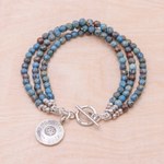 Jasper beaded charm bracelet, 'Three Graces' - Om Symbol Beaded Bracelet with Blue and Brown Jasper