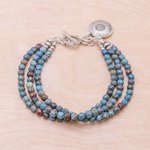 Jasper beaded charm bracelet, 'Three Graces' - Om Symbol Beaded Bracelet with Blue and Brown Jasper