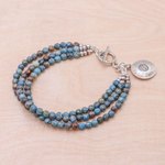 Jasper beaded charm bracelet, 'Three Graces' - Om Symbol Beaded Bracelet with Blue and Brown Jasper